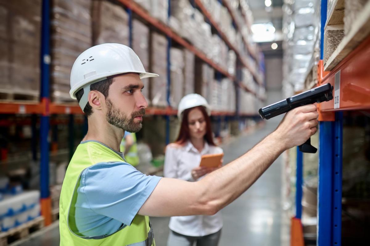 Order Picker at Logistics Warehouse (Freezer Section)